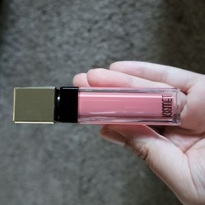 Kismet polished lip plumping gloss in baby